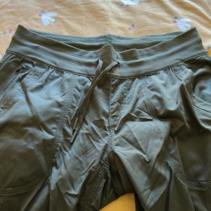 The North Face women’s olive green Medium hiking pants.